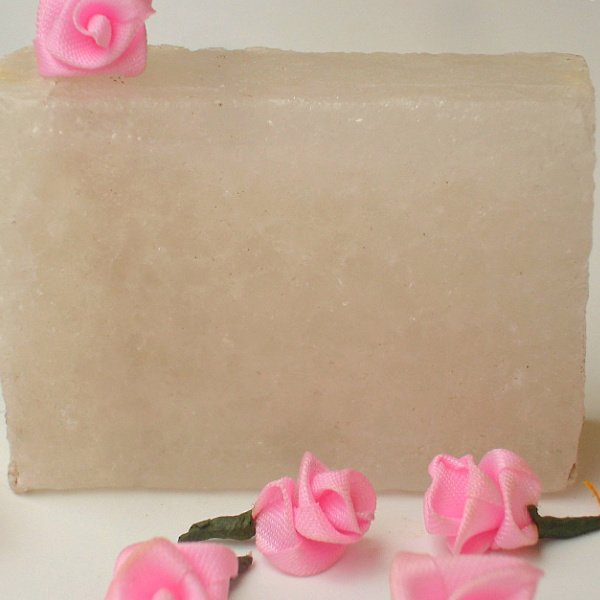 Rubbing alum on the face after shaving to calm small nicks and cuts